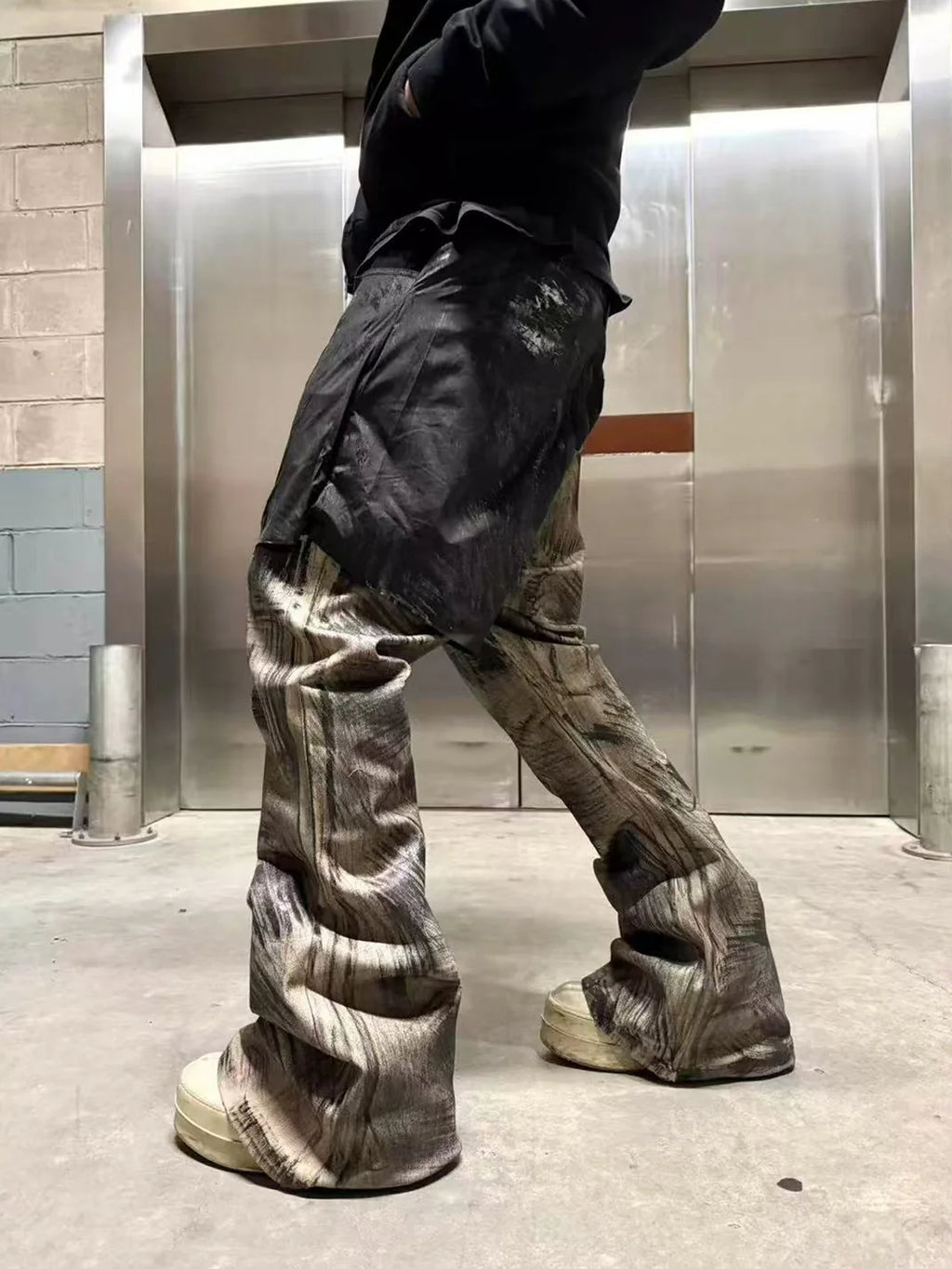Disark Waxed Double-Layered Flared Pants