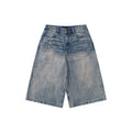 Blue denim shorts on a white background